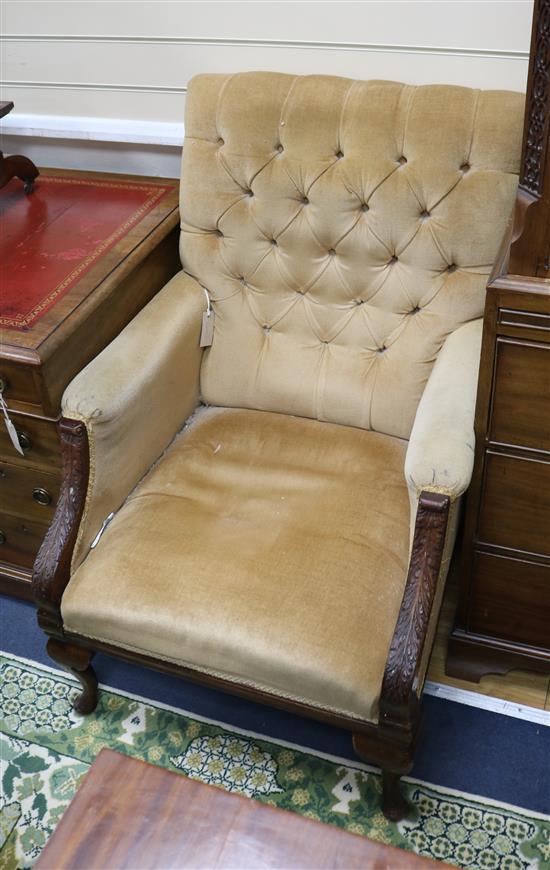 A French walnut button back armchair